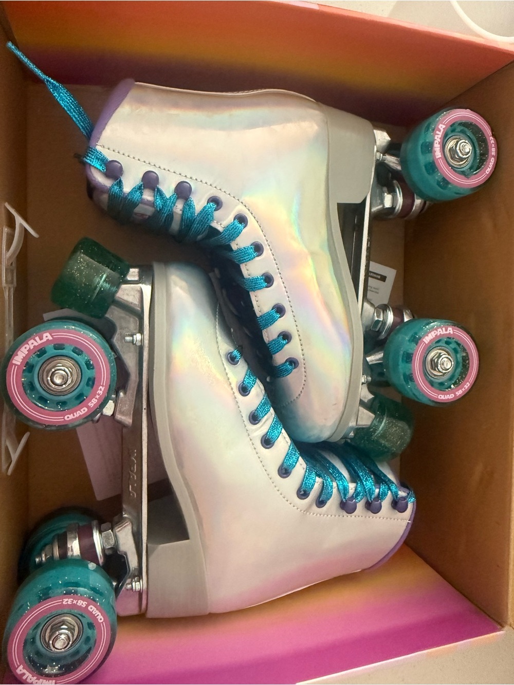 Impala Holographic Roller Skates with Teal Wheels